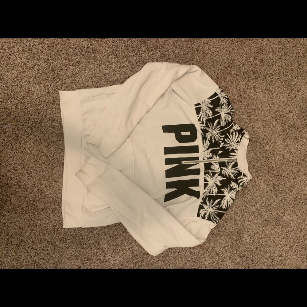 White quarter zip up.